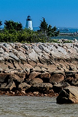 Bird Island Lighthouse Behind Rock Wall